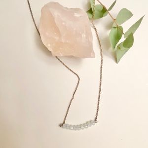 Iridescent bead necklace on medium chain